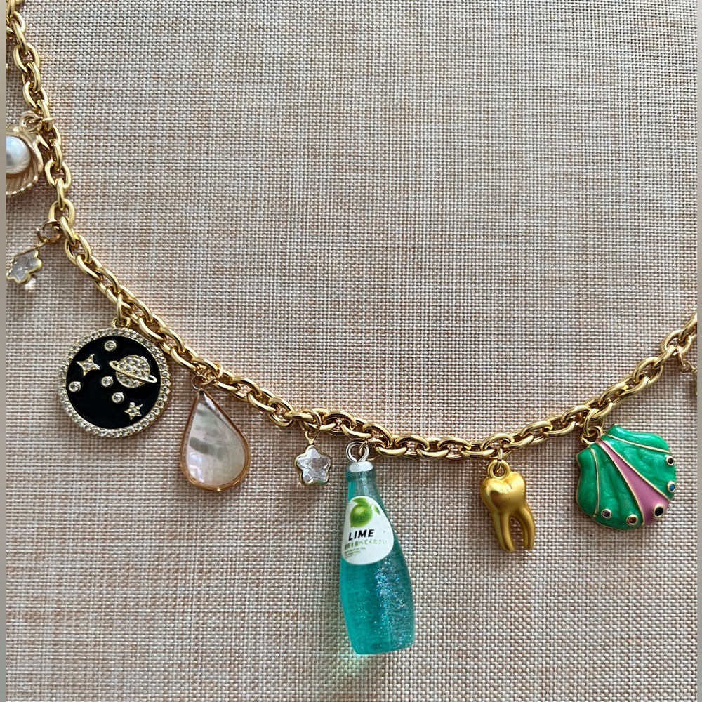 Very adorable charm necklace with gold chain - Picture 2 of 5